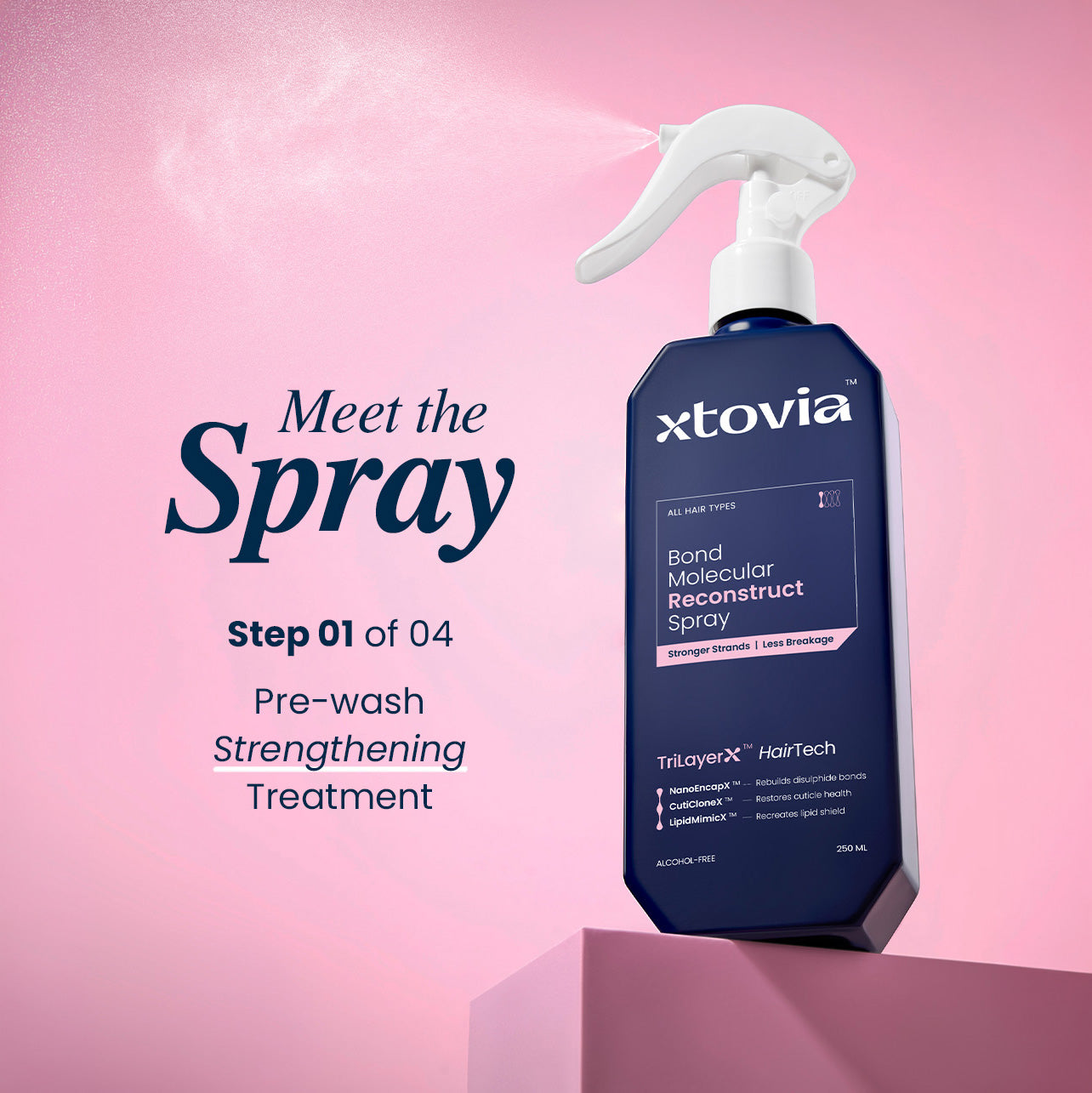 Xtovia Bond Molecular Reconstruct Spray bottle on a pink background